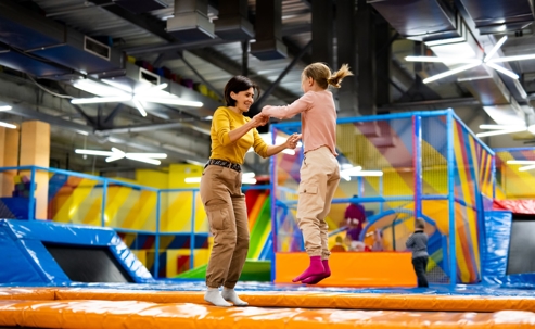 woman and girl at trampoline park